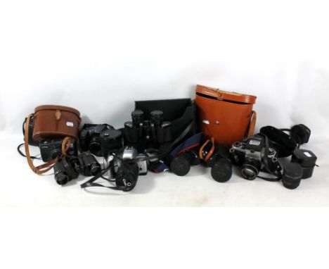 A collection of cameras to include Canon, Minolta and Asahi examples, also binoculars, scales, etc.