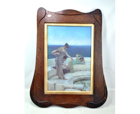 An Arts and Crafts oak picture frame with shaped swept border, 73 x 57cm. CONDITION REPORT: Image within the frame is a print