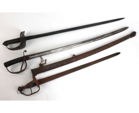 A Victorian cavalry sword with VR cipher to the pierced guard and wirework shagreen grip, a cavalry sabre with scabbard and f