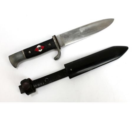 A Third Reich Hitler Youth dagger with blade stamped 'RZM M7/3' and checkered grip inset with red and white enamel lozenge, b