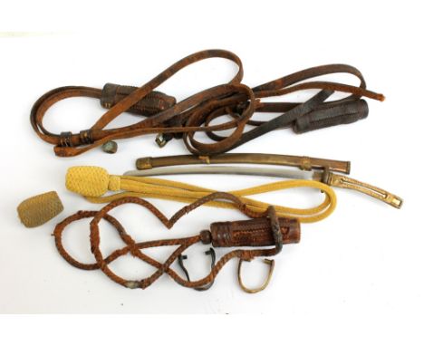 A small Japanese group comprising boxed gold cord, slider and knot, loose gold knot and slider, three leather knots and cords