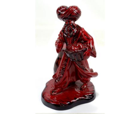 A Royal Doulton flambé figure, HN3278 'The Lamp Seller', height 25cm. CONDITION REPORT: Has been off at both feet and repaire