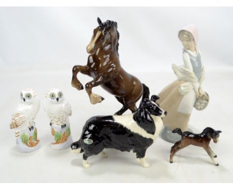 A Beswick rearing horse (af), a Beswick collie and foal, a pair of Staffordshire owls and a Nao figure (af) (6).