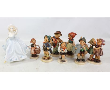 Eight Hummel figures to include a boy playing a violin and a girl with a basket, also a Coalport figure 'Debbie' (9). CONDITI