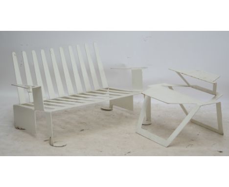 A modern white painted 'comb' garden bench, width 117cm, and a hexagonal two-tiered table (2). CONDITION REPORT: Areas of sur