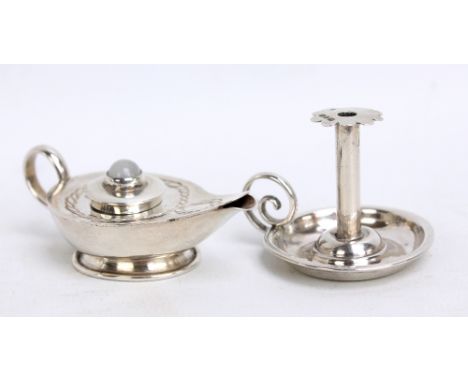LEVI & SALAMAN; a Victorian hallmarked silver miniature chamber stick with lobed sconce and scrolling handle, Birmingham 1891