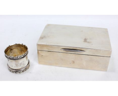 PADGETT & BRAHM LTD; a George VI hallmarked silver rectangular cigarette case with engine turned hinged lid and wooden lined 