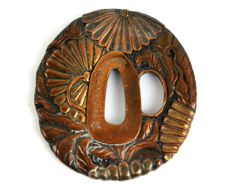 A Japanese bronze floral decorated tsuba with coloured detail and six character mark to upper section, 7.8 x 7.3cm, with pers