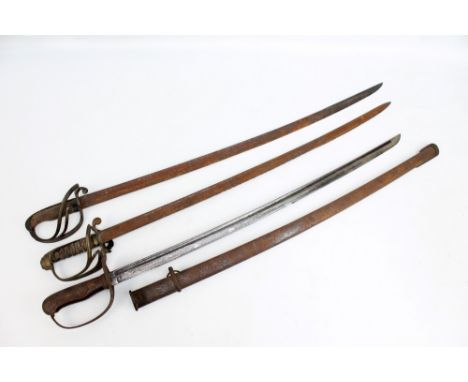 Three swords for restoration, two with brass guards and backstraps and the other with checkered grip and blade numbered indis