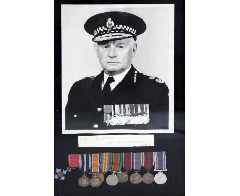 A miniature group of seven including CBE, WWI War and Victory duo, WWII War Medal and Police Long Service and Good Conduct Me