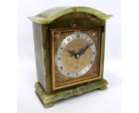 ELLIOT OF LONDON; a green onyx domed mantel clock, the circular silvered chapter ring set with Roman numerals, the dial inscr