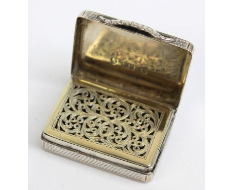 NATHANIEL MILLS; a William IV hallmarked silver rectangular vinaigrette with overall engine turned decoration, centred with a