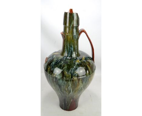 CHRISTOPHER DRESSER FOR LINTHORPE POTTERY; a very large mottled green glazed twin handed vase, impressed marks to base, no.33