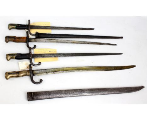 Four French bayonets including chassepot example with metal scabbard, numbered 63/8632 to crossguard and with ribbed metal gr