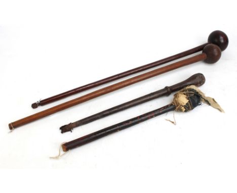 Two African knobkerries, length of both approx 72cm, and two smaller clubs/sticks (one leather bound, both af) (4). CONDITION