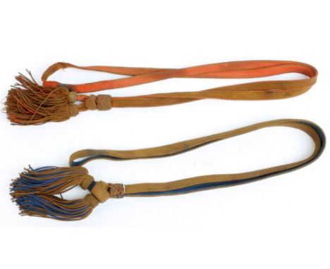 A Japanese Army company officer's shin-guntō brown and blue strap, slider and tassels, and another field officer brown and re