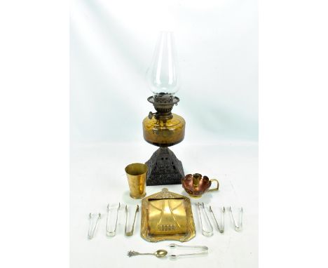 A small group of metalware including Art Nouveau wall plaque with lidded compartment, oil lamp with iron base, copper and bra
