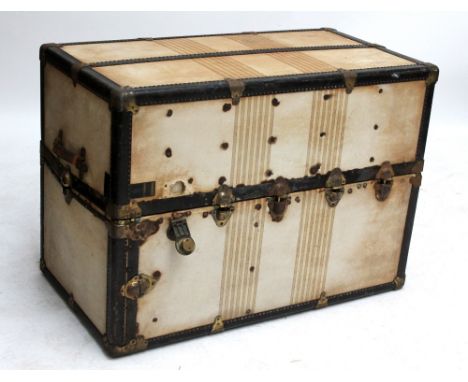 An Oshkocentric vintage steamer travel trunk, with hinged central section set with drawers to one side, a linen bag hanging r