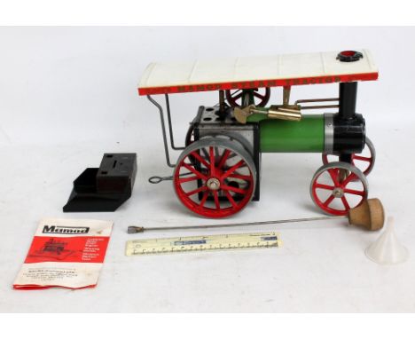 A boxed Mamod steam tractor, length 25.25cm.