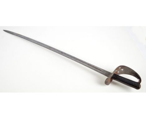 An 1885 pattern cavalry sword with incised grip, pierced knuckle guard and Solingen blade, length of blade 87cm.   CONDITION 