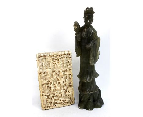 A 19th century Chinese Canton Export carved ivory rectangular card case elaborately decorated with figures in architectural l