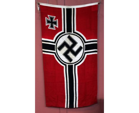 A Third Reich Kriegsmarine flag, stamped 'DT. Reichskriegsf [end indistinct] 100 x 170' with further Kriegsmarine stamp, appr