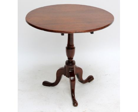 A 19th century oak tilt top table on tripod supports, diameter 69cm (af).