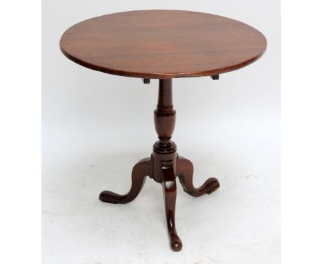 A 19th century oak tilt top table on tripod supports, diameter 69cm (af).