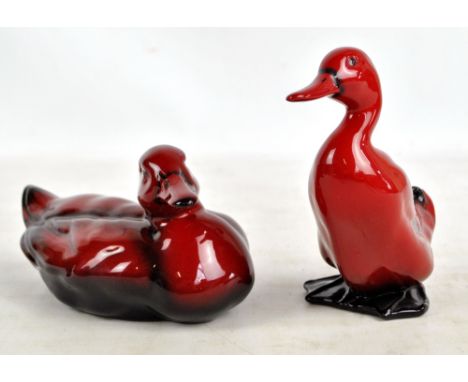 Two Royal Doulton flambé figures of ducks, the larger length 18cm, the other height 15cm (2). CONDITION REPORT: The larger du