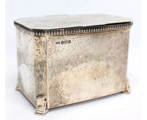 FRANK COBB & CO LTD; an Edward VIII hallmarked silver tea caddy of plain rectangular form with canted corners and stepped fee