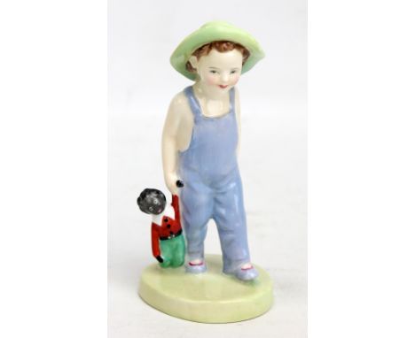 A Royal Doulton figure; HN2040 'Gollywog', height 13.7cm. CONDITION REPORT: Light surface wear but ok.
