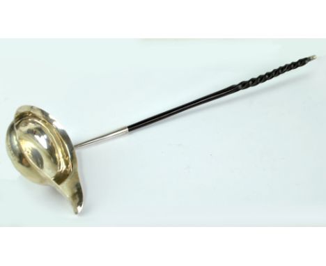 A George III hallmarked silver toddy ladle with single lipped oval bowl and baleen handle (tip af), initialled WPM, maker's m