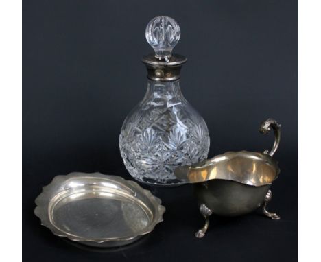 HARRISON BROS & HOWSON LTD; an Elizabeth II hallmarked silver collared clear glass perfume bottle, Birmingham 1988, height 18