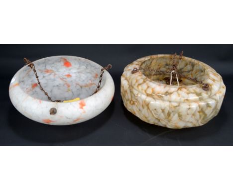 A 1930s moulded mottled glass pendant light fitting, diameter 35cm, and a 1950s example, diameter 34cm (2).