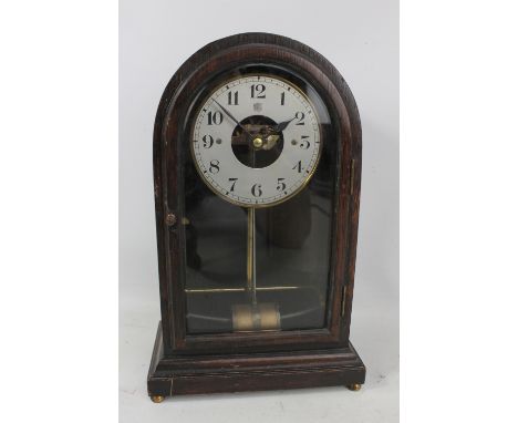 BULLE; an oak cased domed mantel clock with Arabic numerals, on plinth base with bun feet, height 35cm. CONDITION REPORT: App