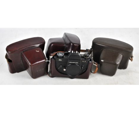 LEITZ WETZLAR; a cased Leicaflex SL 2 camera body, also two empty Leica and Leitz Wetzlar cases (3). CONDITION REPORT: Light 