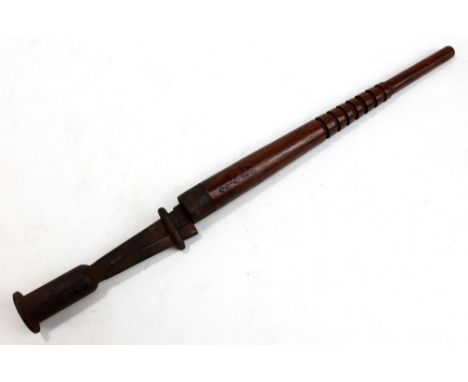 A wooden practice bayonet (possibly), stamped 'F[?].A.8.93', with iron lower section stamped 'F.1.93', possibly WWI period, l