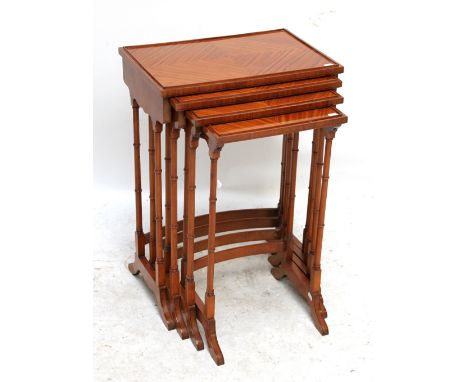 An Edwardian satinwood quartetto nest of tables with ebony string inlay, top 51 x 34.5cm, with copy of provenance. CONDITION 