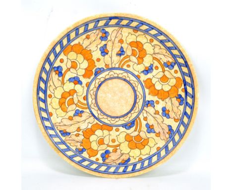 CHARLOTTE RHEAD; a ceramic floral tubeline decorated circular charger, signed to base, number 2681, diameter 36cm. 