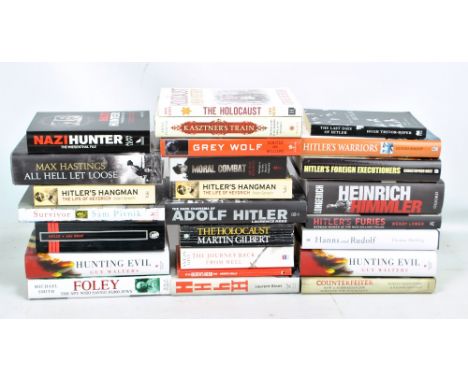 A collection of Third Reich interest books including 'Hunting Evil' by G. Walters, 'Hitler' by J. Toland, 'Hitler's Warriors'