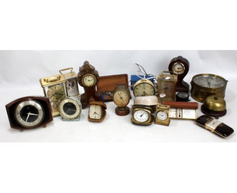 A mixed lot of various timepieces to include an Art Deco style Metamec example, an Edwardian inlaid balloon mantel clock, a S
