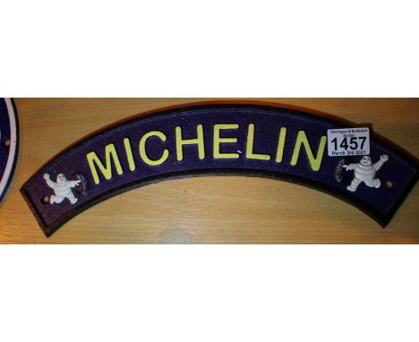 Cast iron Michelin sign, L: 40 cm. P&amp;P Group 2 (£18+VAT for the first lot and £3+VAT for subsequent lots) 