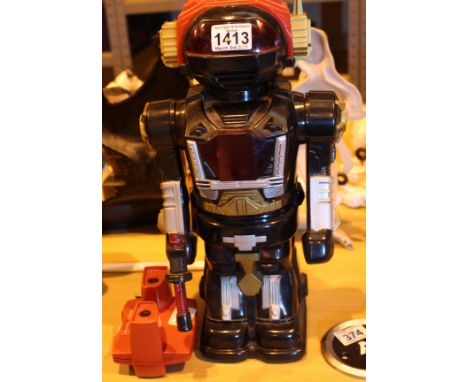 Battery operated robot and a red Videomaster. Not available for in-house P&amp;P, contact Paul O'Hea at Mailboxes on 01925 65
