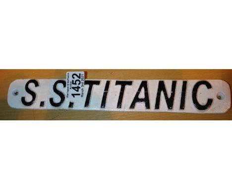 Cast iron S.S Titanic sign, L: 30 cm. P&amp;P Group 1 (£14+VAT for the first lot and £1+VAT for subsequent lots) 