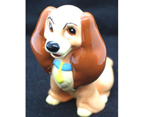 Disney ceramic lady from the Lady and the Tramp series, H: 9 cm. P&amp;P Group 1 (£14+VAT for the first lot and £1+VAT for su