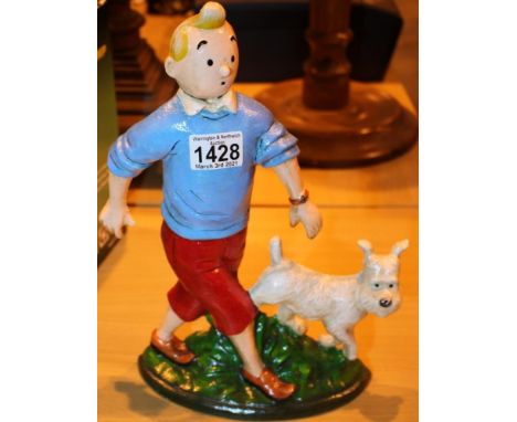Cast iron TinTin, H: 28 cm. P&amp;P Group 3 (£25+VAT for the first lot and £5+VAT for subsequent lots) 
