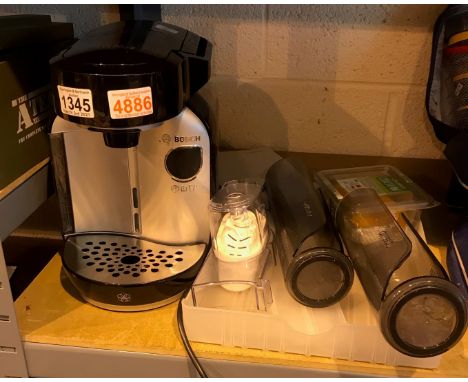Bosch Tassimo coffee maker and caddy. Not available for in-house P&amp;P, contact Paul O'Hea at Mailboxes on 01925 659133 .Co
