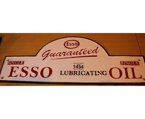 Cast iron Esso Oil sign, L: 48 cm. P&amp;P Group 2 (£18+VAT for the first lot and £3+VAT for subsequent lots) 