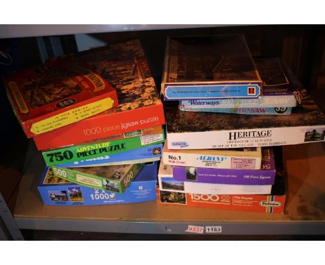 Shelf of mixed jigsaws, contents unchecked. Not available for in-house P&amp;P, contact Paul O'Hea at Mailboxes on 01925 6591