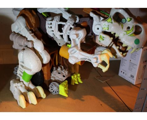 Large battery powered robot dinosaur. Not available for in-house P&amp;P, contact Paul O'Hea at Mailboxes on 01925 659133 